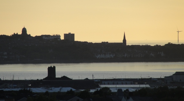 10.06.21 Liverpool the longest day (evening) Wirral skyline and Mersey Estuary wind turbines